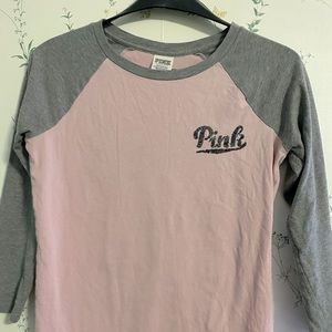 Small PINK long sleeve t shirt. PINK labeled on ft chest and back in sequins.